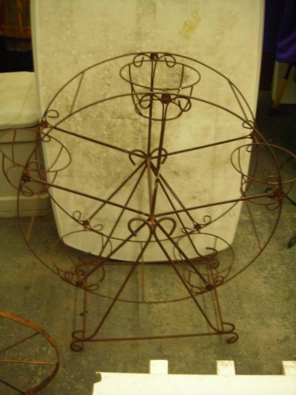 lot 36 image: Ornamental Iron Plant Pot Ferris Wheel 42 Inch
