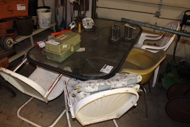 lot 33 image: Glass Top Table and Chairs (5)