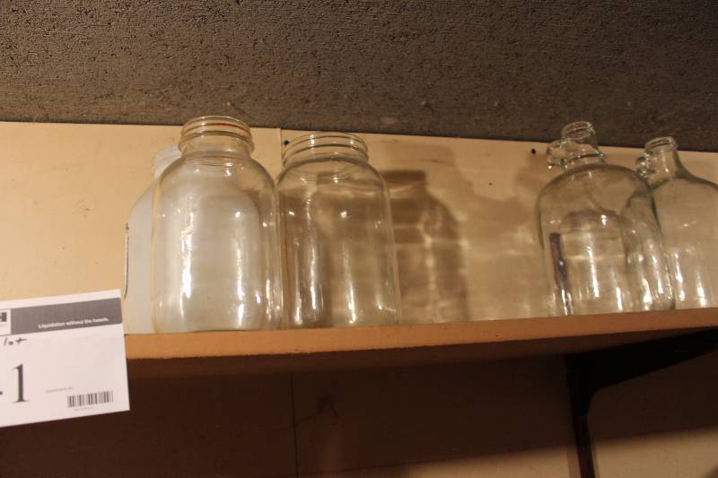lot 41 image: Shelf Lot includes glass jugs, jars and more
