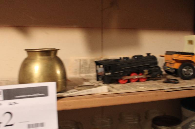 lot 42 image: Shelf Lot includes crock pot, candles, collectible toy train engine and more