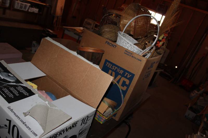 lot 65 image: Table Lot includes wicker baskets, clothes, tricycle, and more but NOT including table