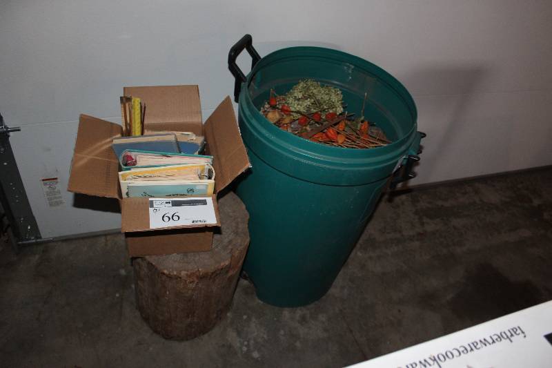lot 66 image: Dried flowers, various books, log big enough for sitting