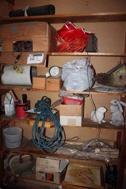lot 68 image: Shelf Lot includes electrical power cords (2), ceramic rabbits, a bowling ball bag and more