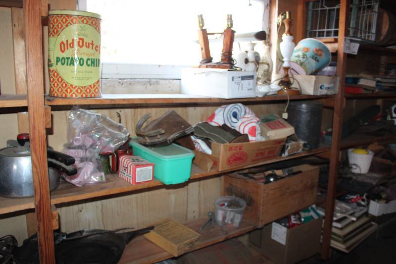 lot 71 image: Shelf Lot includes lamps without shades, tupperware, a cooking pan, kitchen gadgets and more