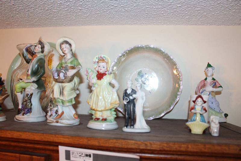 lot 109 image: Top Shelf Lot includes ceramic figuines, fancy plates, vases and more