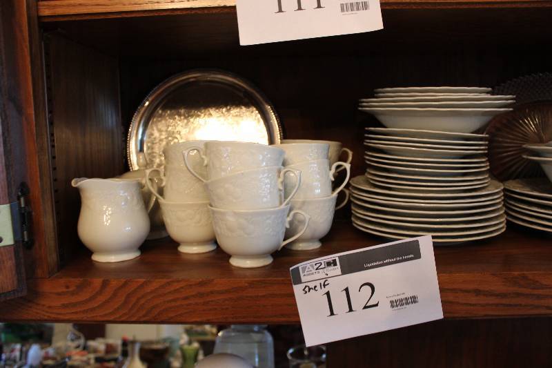 lot 112 image: Shelf Lot includes plates, tea cups and bowls