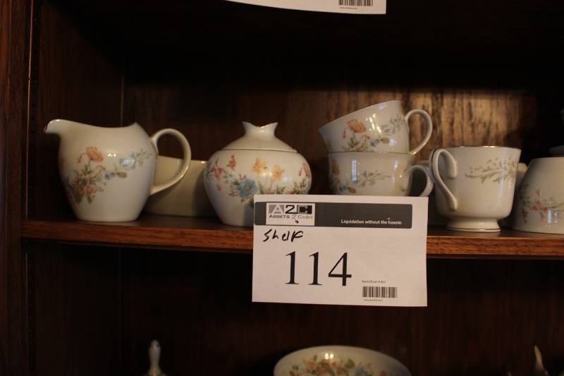 lot 114 image: Shelf Lot includes sugar bowl and cream pitcher, coffee cups, plates and more