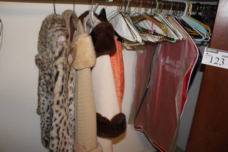 lot 123 image: Closet Lot includes faux fur coats (3) hangers and more