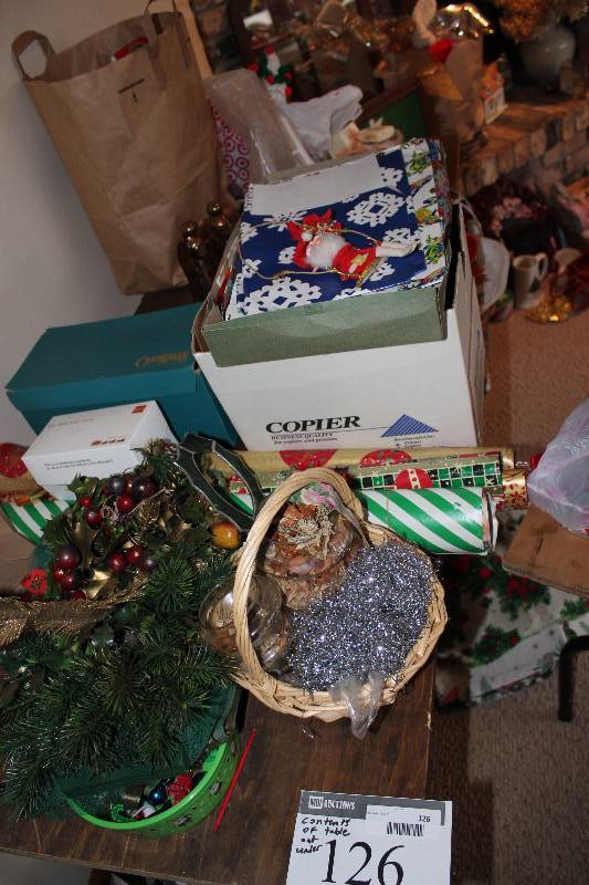 lot 126 image: Table Lot includes wrapping paper, Christmas decorations and more