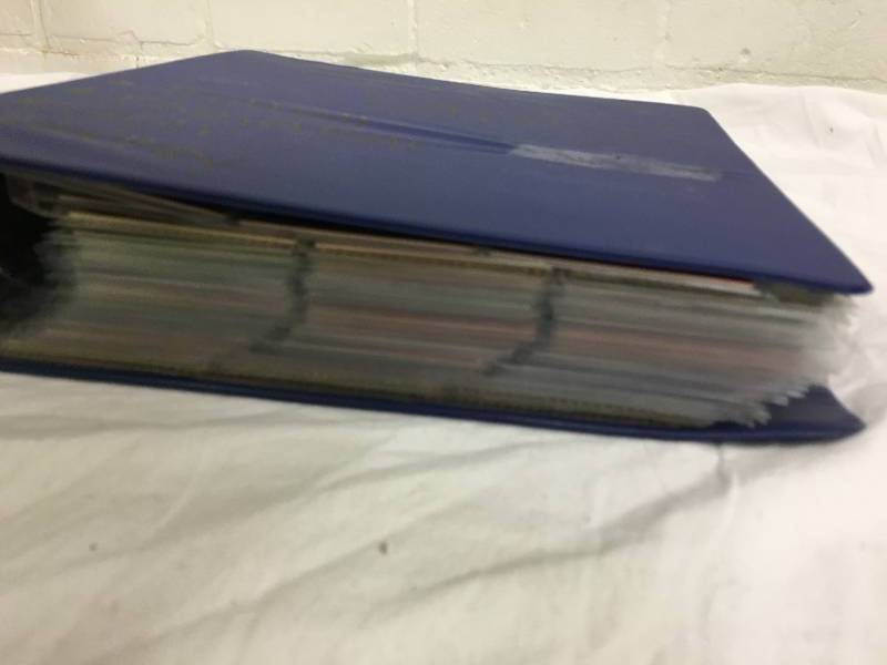 folder full of football cards