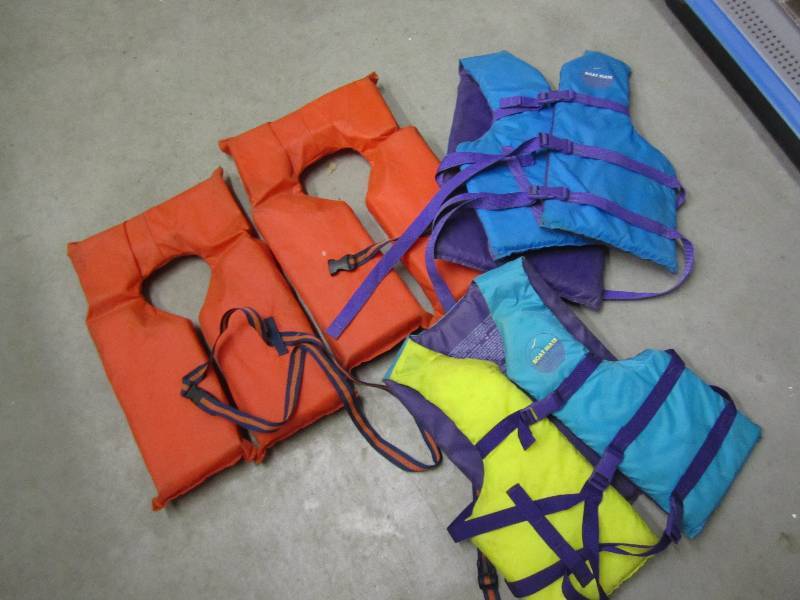 Lot of life preservers and flotatio...