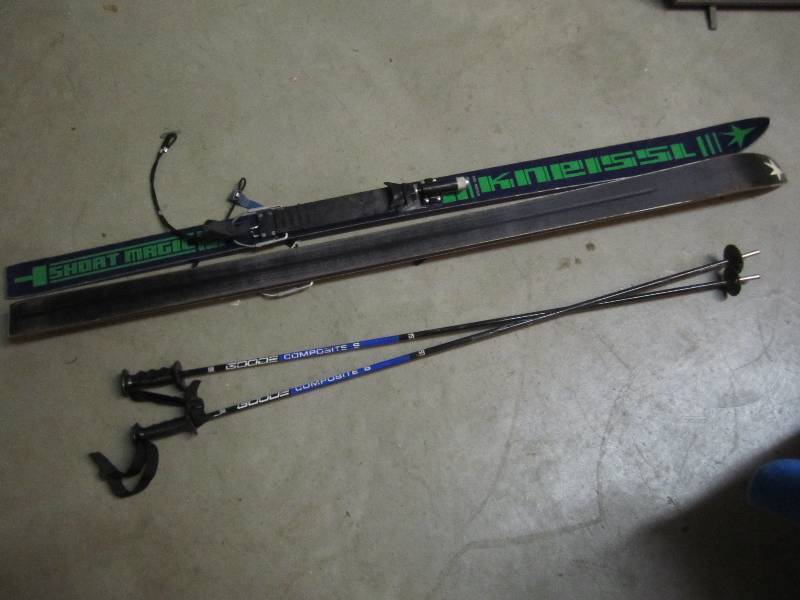 Pair of Kmeissl skiis with poles...