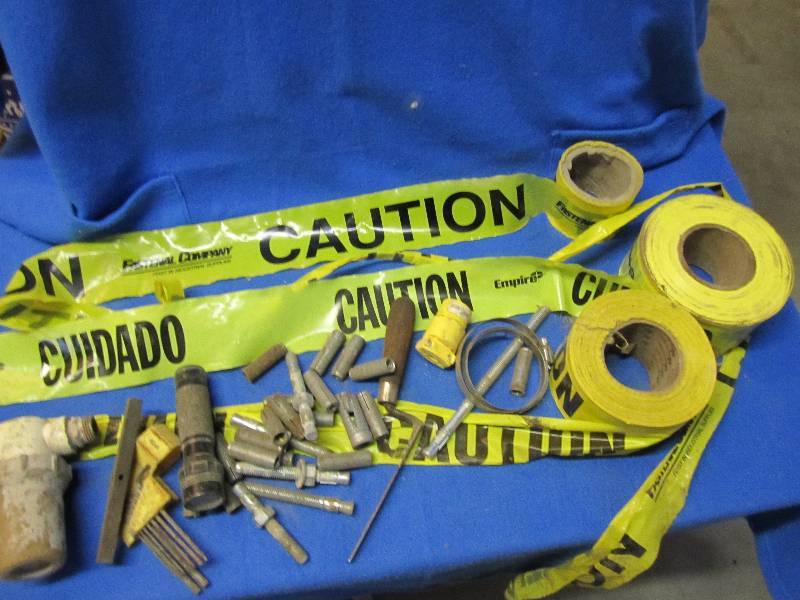 lot of caution tape, anchors, alen ...