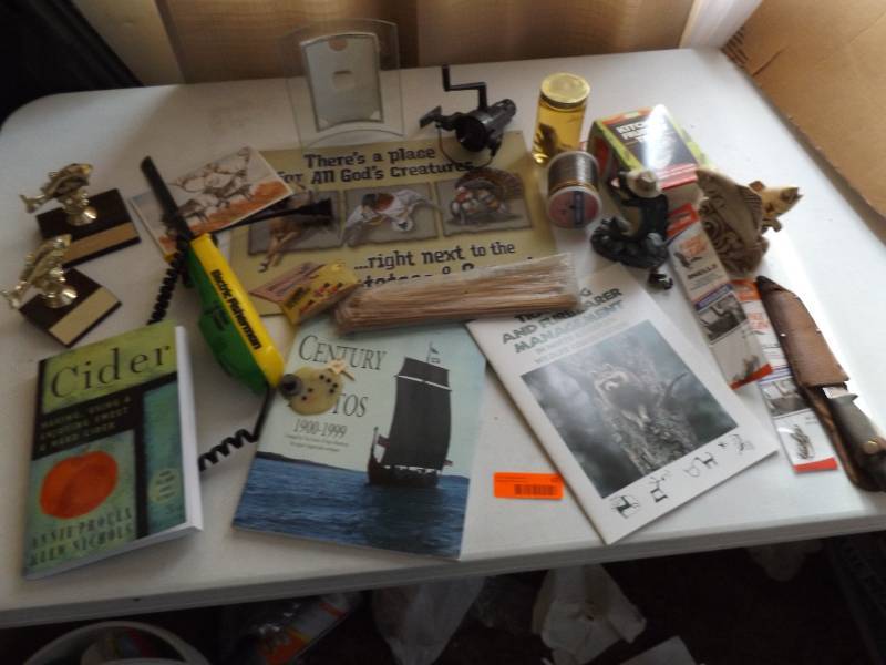 Fishing Items and a preserved Baby Skunk