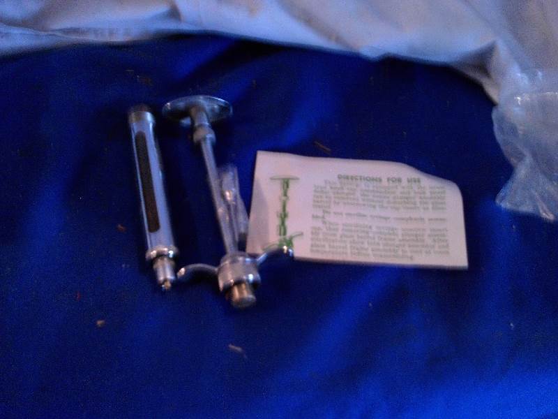 vintage metal syringe