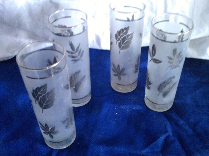 set of 4 vintage gold trimmed glasses