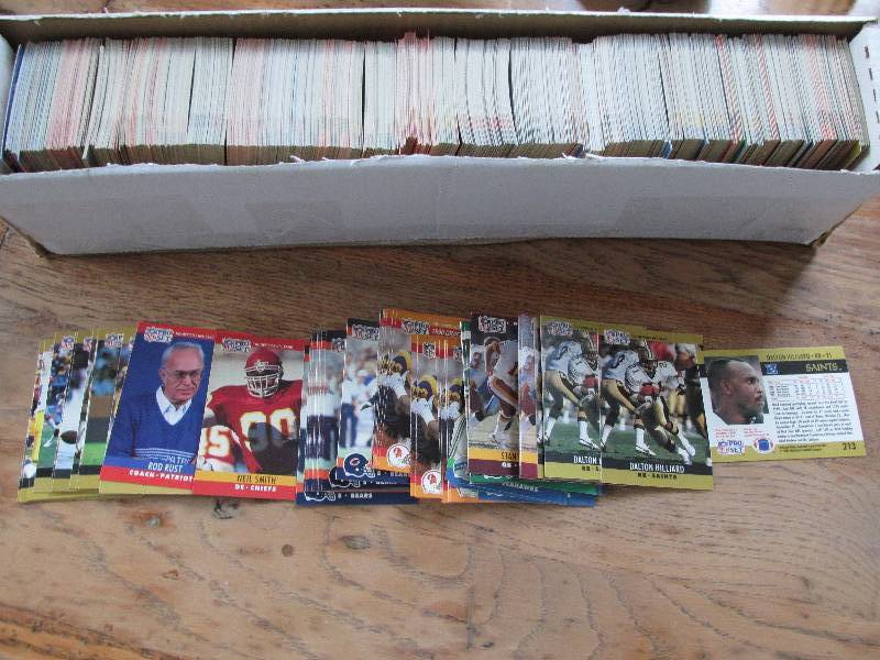 Box of 1990 Proset football cards...