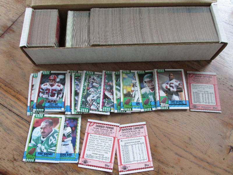 Box of 1990 Topps football cards...