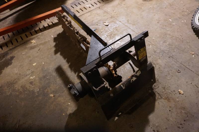 lot 21 image: Toro Brand Mini Dingo Skid Loader Skid Steer Trencher Attachment