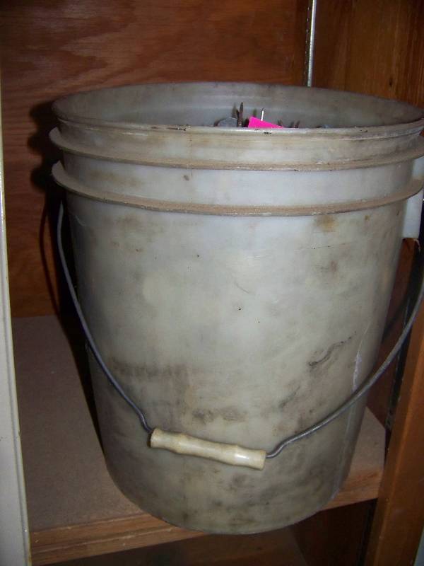Bucket of cap nails