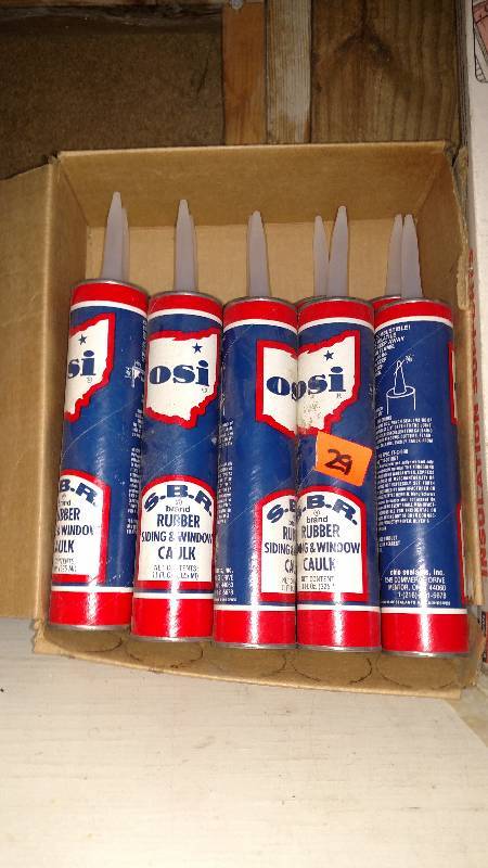 Case of caulk,siding nails, split boxes