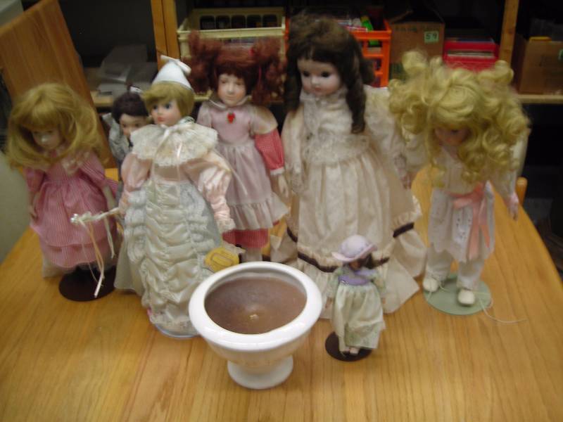 Collection Of Porcelain Dolls With Stands