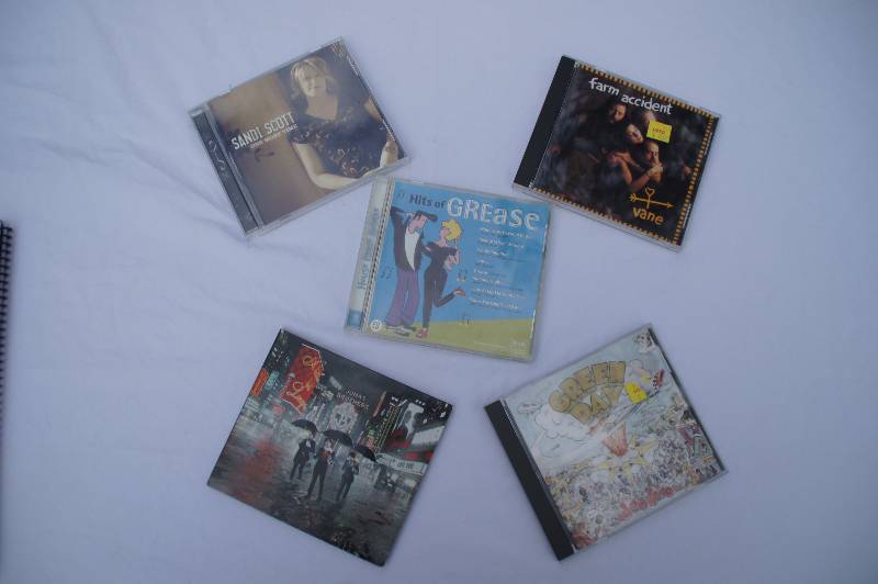 Lot of CDs including one Karaoke