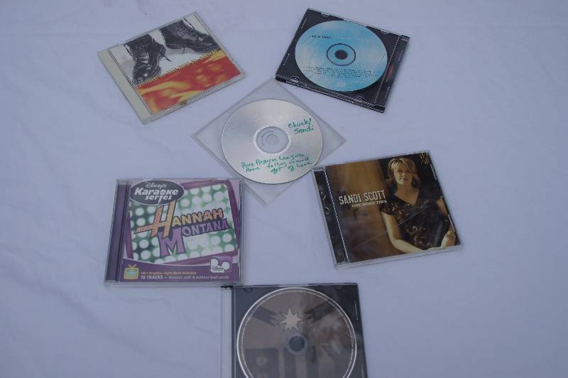 Lot of CDs including one Karaoke