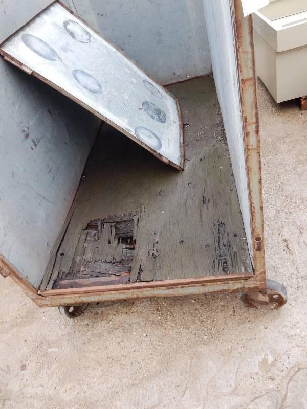 lot 18A image: Heavy Metal rolling refuse cart..  84in x 42in x 60 in