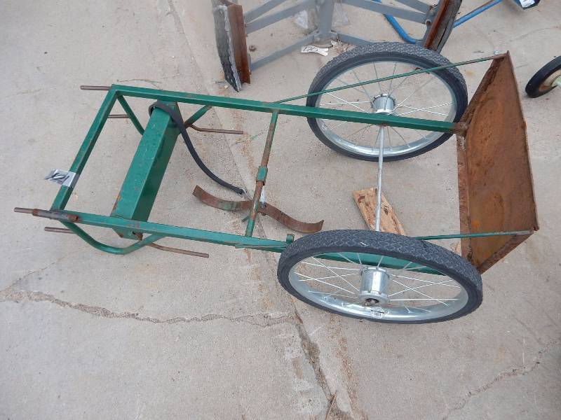 lot 121 image: 2 tank upright cart with spoked wheels