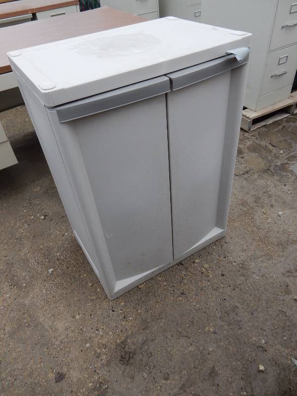 lot 174 image: Plastic storage Cabinet.. 36in w x 16in d x 36in h.