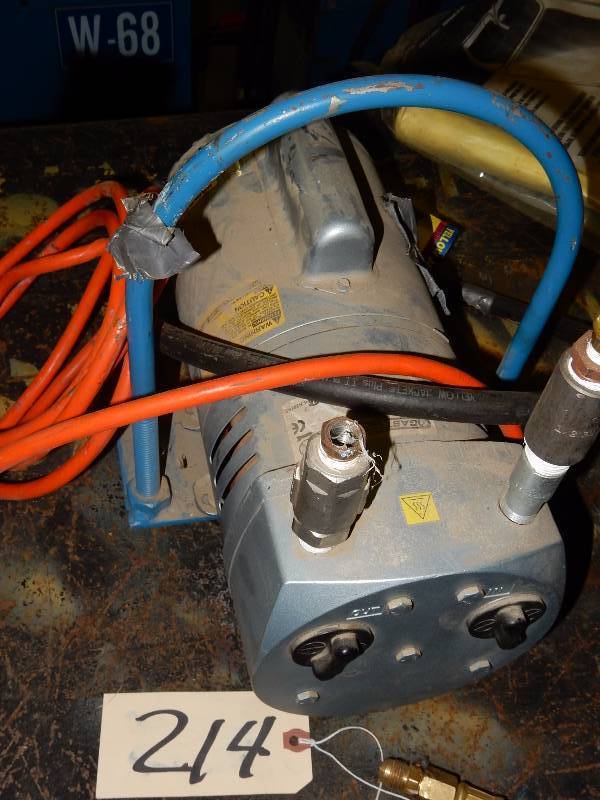 lot 214 image: GE Motor Pump  34 h.p..  Think it is for refrigeration as on of the hoses is a refrigeration hose