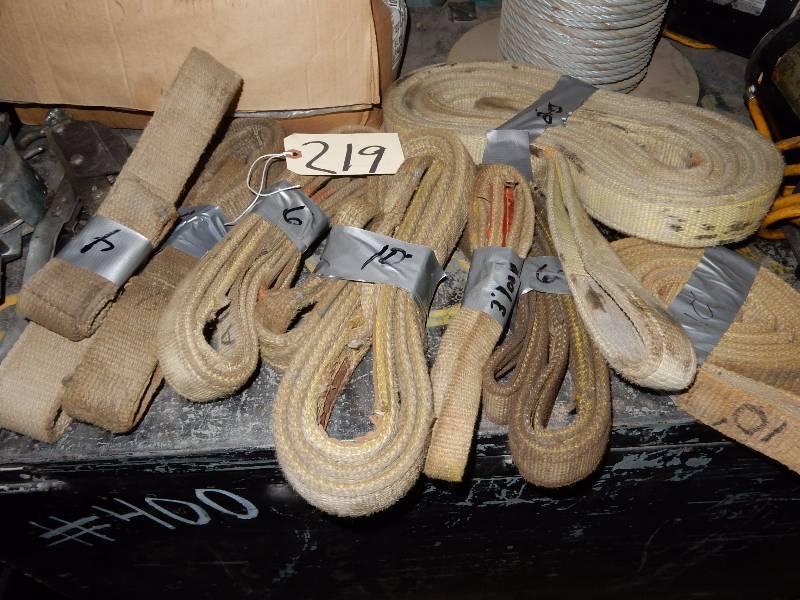 lot 219 image: 8 Tow Belts.. Length in Feet is noted on each belt