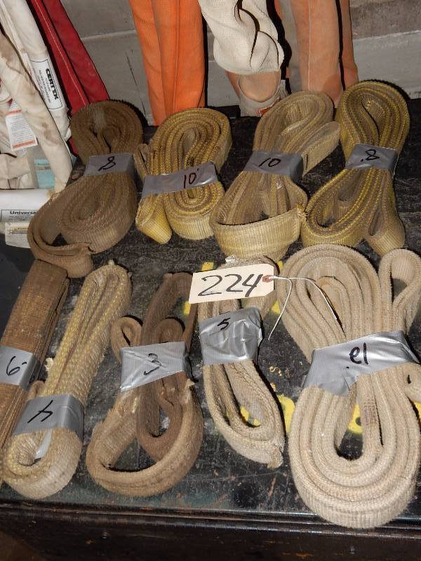 lot 224 image: 10 Tow Belts.. Length in feet is noted on each belt
