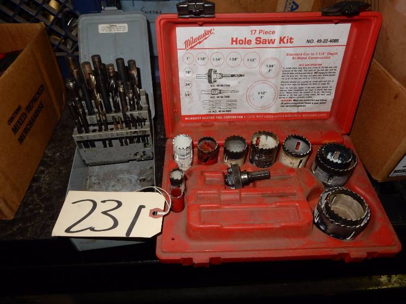 lot 231 image: Milwaukee Hole Saw kit and set of drill bits.. Im not sure if the hole saws are really milwaukee, but in a Milwaukee box