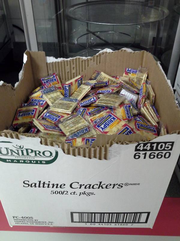 lot 18 image: Assorted Plasticware, Crackers, Salt & Pepper Packets