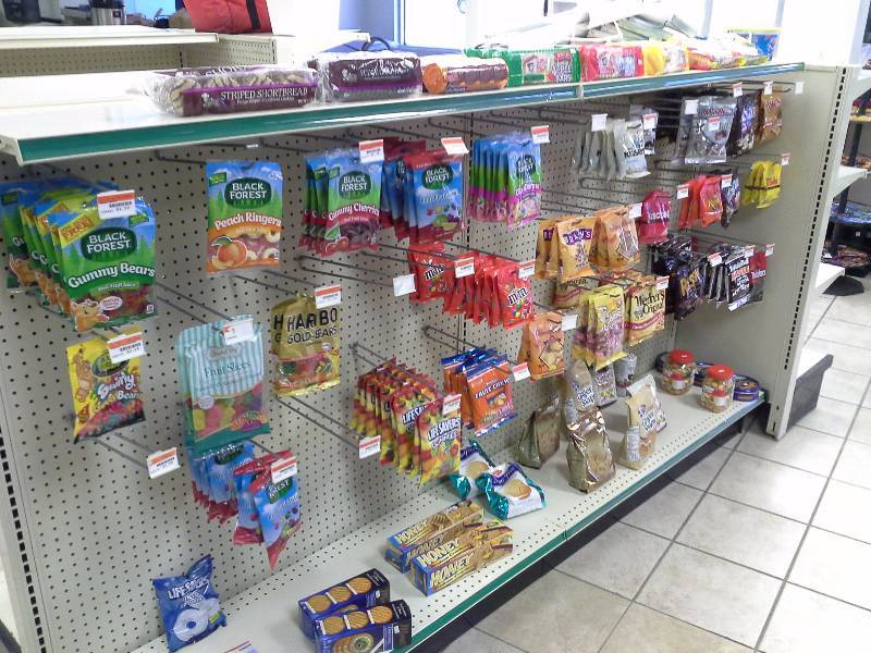 lot 23 image: Lot of Assorted Bags of Candy & Cookies (174 items)