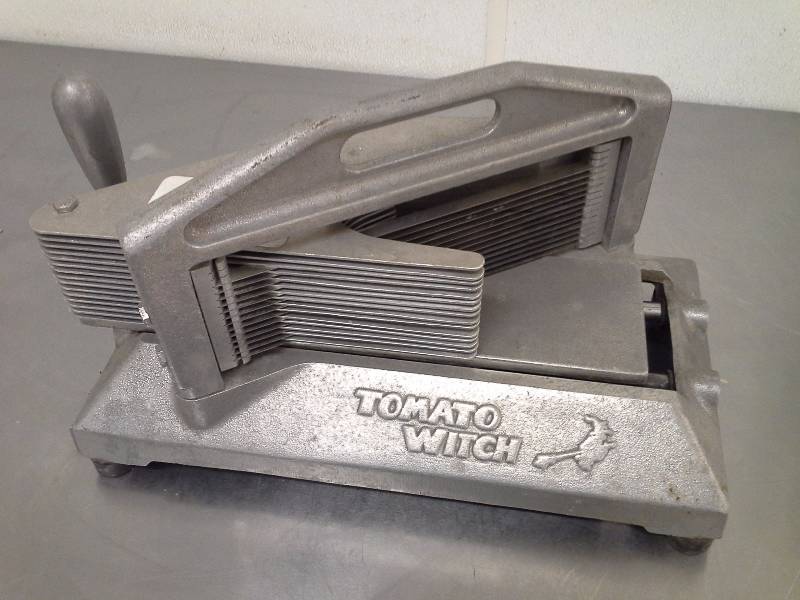 lot 63 image: Tomato witch tomato slicer