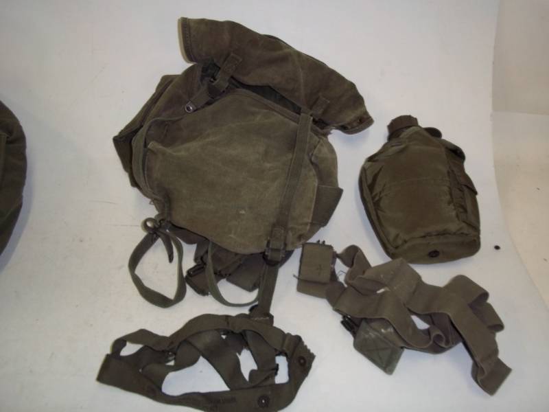 Army Canteen, Helmet liner, straps and small backpack