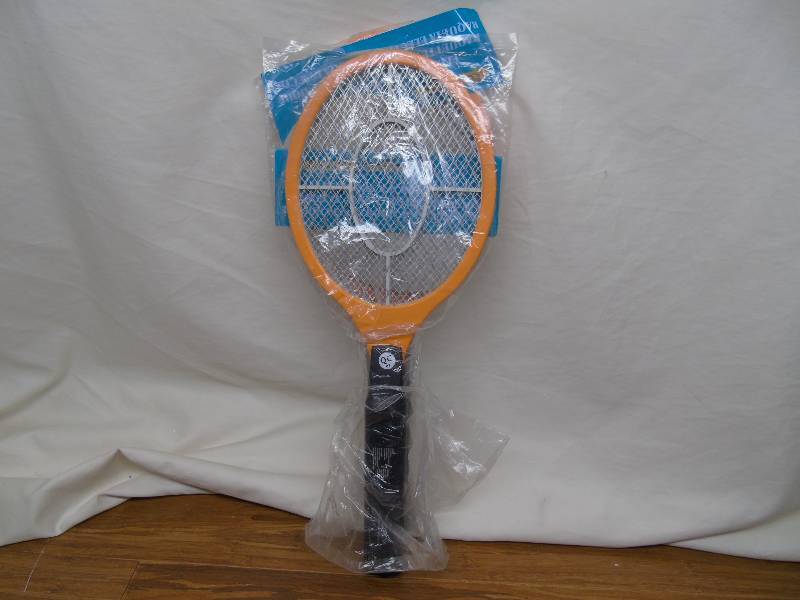 lot 9 image: Bite Shield Racket Zapper