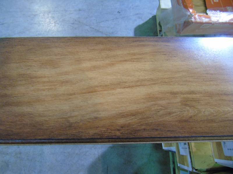 lot 63 image: Jatoba Laminate Flooring 8mm Thick x 5 in. Wide x 47-34 in. Length Planks 13.26 sq.ft. per case