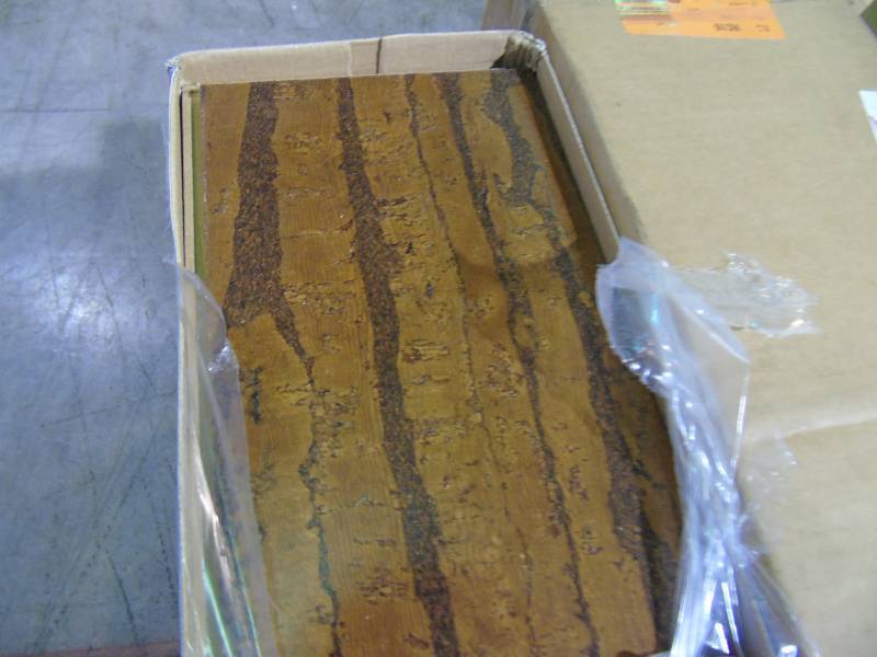 lot 66 image: 8 cases of Dark Exotic Plank 1332 in. Thick x 5-12 in. Wide x 36 in. Length Click Cork Flooring (10.92 sq. ft.  case)