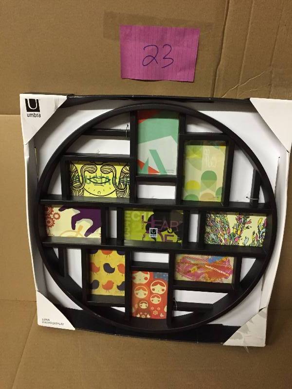 lot 23 image: Umbra Luna Nine-Opening Collage FrameWall Decor, Black