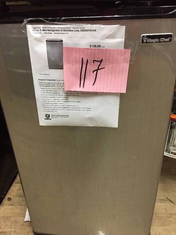 lot 117 image: Magic Chef Mini Refrigerator in Stainless Steel Look 3.5 cu small dent on the side