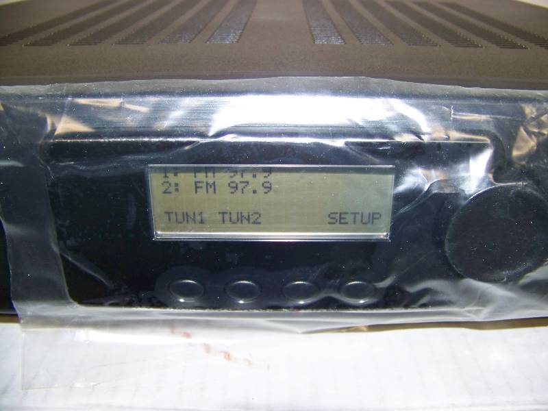 lot 54 image: Control 4, MultiTuner  Multi Tuner, XM Satellite Radio Receiver in original box
