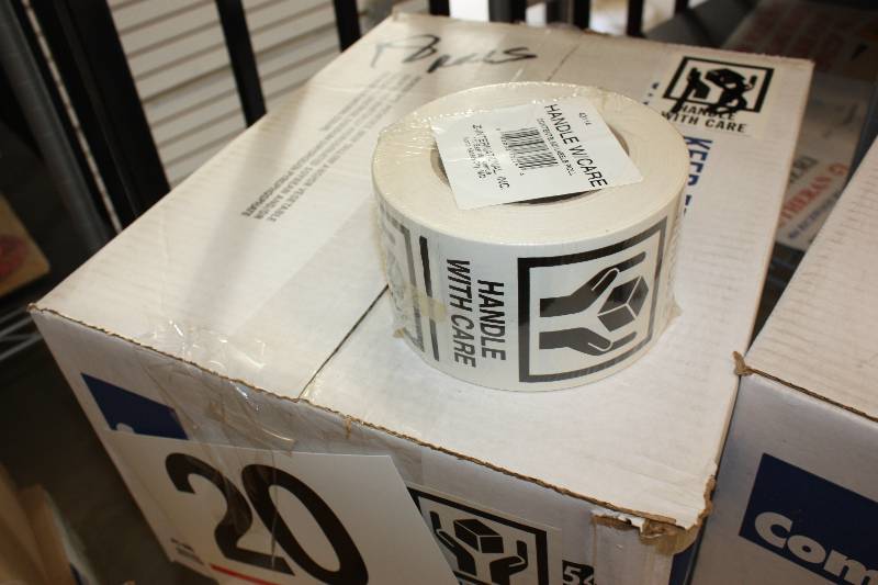 36 rolls of Handle With Care Labels