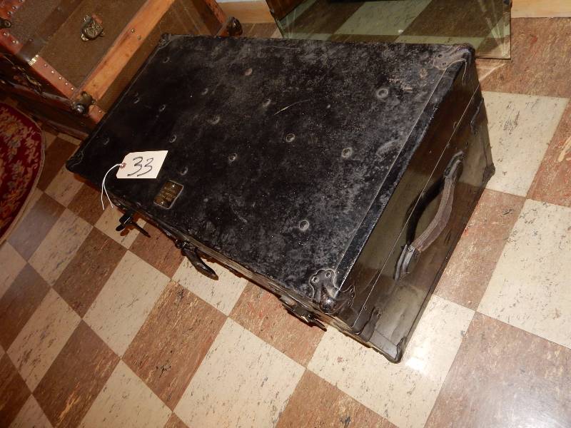 Metal Steamer trunkFoot Locker.. Good leather handles.. 30 in x 16in x 12in.    Note the name engraved.