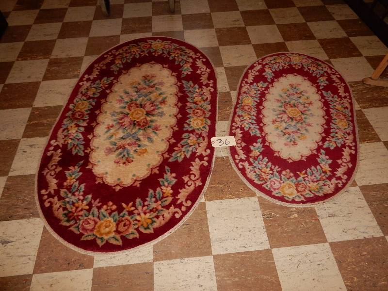 2 Wool Rugs.. Decorated by Karastan.. One has a little damage on the edge, but overall nice shape..