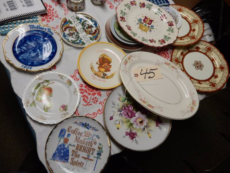large lot of decorative plates as pictured.. Bring your own packaging material