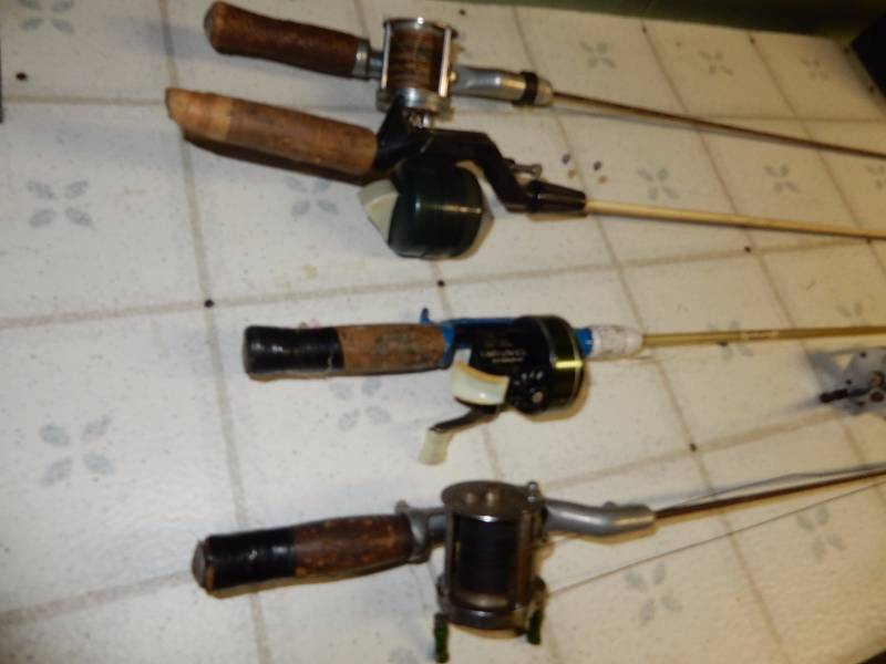 4 Fishing RodsReels and 2 Fishing reels as pictured. Two of the Rods are all metal.